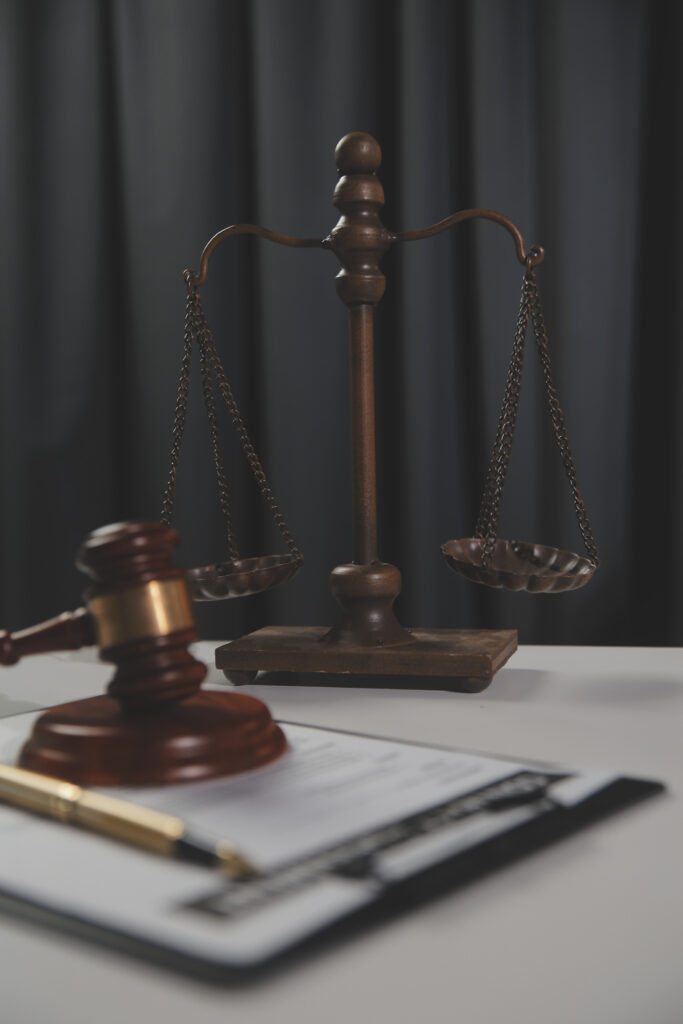 Law theme, gavel or mallet of the judge, lawyer enforcement officers, evidence-based cases taken into account in the court abount business, legislation.